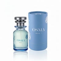 Osma Woody F Pineapple & Leather 75ml EDP — A light blue glass perfume bottle with a silver cap and a matching blue cylindrical box with floral designs, displayed on a white background.