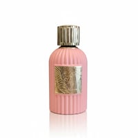 Paris Corner Qissa Pink by Paris Corner 100ml for Women — Pink fluted bottle with a gold ribbed cap and a gold embossed label featuring palm leaves.