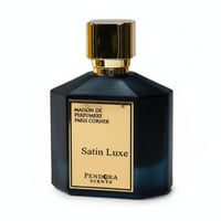 Paris Corner Satin Luxe by Paris Corner Pendora Scents — Dark blue faceted perfume bottle with a gold cap and a gold label featuring "MAISON DE PERFUMERY PARIS CORNER" and "Satin Luxe Pendora Scents"