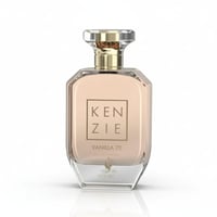 Volare Vanilla 70 Kenzie by Volare – 100 ml for Women, a clear glass perfume bottle with a faceted geometric design, a gold cap, and a light peachy-pink liquid inside. The label features the brand name 'KENZIE' in a square outline.