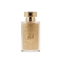 Zimaya Al Embratur Elixir by Zimaya 100ml EDP — Clear glass perfume bottle with ornate gold Arabic calligraphy and intricate gold filigree pattern on the front, topped with a decorative gold cap.