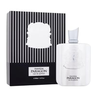 Zimaya Phantom Paragon EDP 100ml Man — Botol minyak wangi putih dengan lambang timbul dan penutup perak, bersebelahan kotak berjalur hitam putih dengan lambang timbul putih.