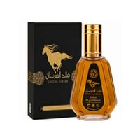 Ard Al Zaafaran Qaed Al Fursan by Ard Al Zaafaran 50ml — A black perfume box with a golden horse silhouette and Arabic text stands next to a clear glass perfume bottle with golden accents and similar branding. | Ard Al Zaafaran Qaed Al Fursan by Ard Al Zaafaran 50ml — Kotak minyak wangi hitam dengan siluet kuda emas