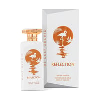 Gulf Orchid Reflection For Her 100ml by Gulf Orchid — White perfume bottle and its box, both featuring a circular orange graphic of a flamingo reflected in water with palm leaves. | Botol minyak wangi putih dan kotaknya, kedua-duanya menampilkan grafik bulatan oren seekor flamingo yang terpantul di air dengan daun