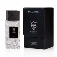 Bujairami Shadow Script - Bujairami 100ml Extrait — Clear faceted glass perfume bottle with a black wooden cap next to a black textured presentation box with silver branding.
