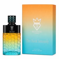 Bujairami The Rock Intensely by Bujairami 100ml EDP — A hexagonal patterned glass perfume bottle with a gradient of yellow to blue, next to its matching orange and blue gradient box with honeycomb pattern.