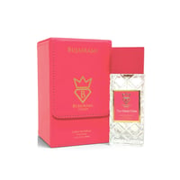 Bujairami Too Damn Clean 100ml Extrait — Pink leather box and clear faceted glass perfume bottle with pink label and gold crown logo, set against a white background.