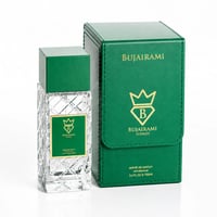 Bujairami Vibration by Bujairami 100ml Extrait de Parfum — Clear glass perfume bottle with green cap and gold label, next to a matching green presentation box with gold emblem and text.