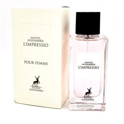 Maison Alhambra L'Impressio Pour Femme — A pale pink perfume bottle with a black cap stands next to its matching cream-colored box, both featuring a deer logo.