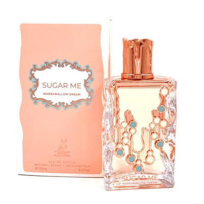 Maison Alhambra Sugar Me Marshmallow Dream — Pink box with ornate label and glass perfume bottle with rose gold cap and decorative dripping design with blue and white accents.