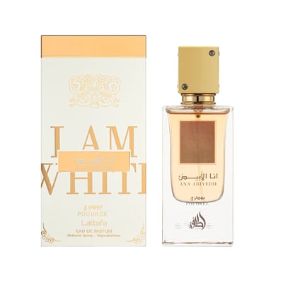 Lattafa Ana Abiyedh Poudree by Lattafa 60ml — A white box with gold accents and Arabic calligraphy sits next to a clear glass perfume bottle with a gold cap and a brown label. | Lattafa Ana Abiyedh Poudree by Lattafa 60ml — Kotak putih dengan aksen emas dan kaligrafi Arab duduk di sebelah botol minyak wangi kaca