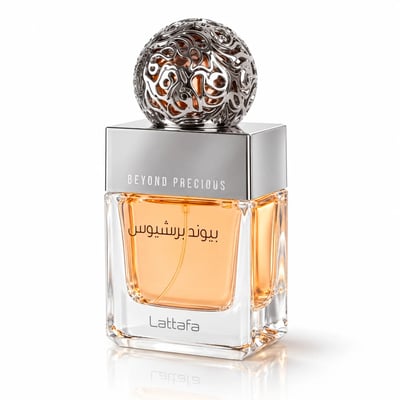 Lattafa Beyond Precious by Lattafa 100ml EDP Women — Square glass perfume bottle with orange liquid, silver metallic ornate cap, and silver band with 'BEYOND PRECIOUS' text.