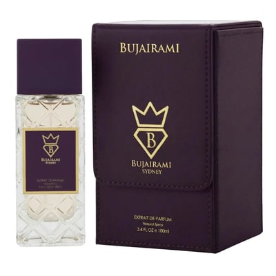 Bujairami Billion Dollar by Bujairami 100ml Extrait — Clear faceted glass perfume bottle with a purple cap and gold label, next to its matching purple presentation box with gold accents.