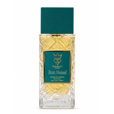 Bujairami Born Nomad — Clear glass perfume bottle with textured sides, filled with golden liquid, topped with a teal cap and gold accents.