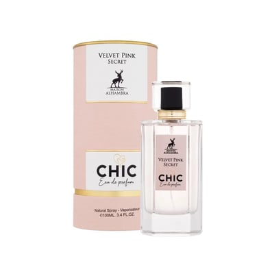 Maison Alhambra Chic Velvet Pink Secret for Women 100ml — A pink cylindrical box stands next to a clear glass perfume bottle with a black cap and gold accents. The box and bottle label feature a deer silhouette and the text "Velvet Pink Secret" and "Chic Eau de parfum". | Maison Alhambra Chic Velvet Pink Secret for