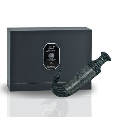 Niche Emarati Khanjar by Niche Emarati 85ml EDP — Black gift box with silver label, and a decorative dagger-shaped perfume bottle in antique silver finish.