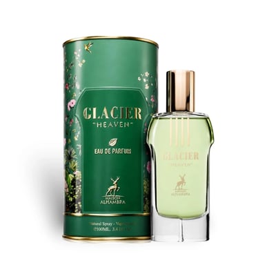 Maison Alhambra Glacier Heaven 100ml — Green floral patterned cylindrical box with a glass perfume bottle in front, both featuring gold accents and deer motifs. | Maison Alhambra Glacier Heaven 100ml — Kotak silinder hijau bermotif bunga dengan botol minyak wangi kaca di hadapannya, kedua-duanya menampilkan aksen emas