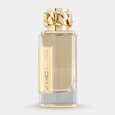 Afnan Lynked Forever by Afnan 100ml Eau De Parfum — A clear glass perfume bottle with a gold chain-link cap and a gold label reading 'LYNKED by AFNAN'