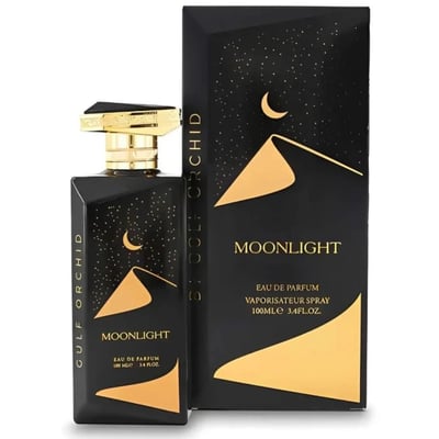 Gulf Orchid Moonlight Eau De Parfum — Black perfume bottle with gold accents and starry night design, next to its matching black box with desert dunes and crescent moon graphic. | Gulf Orchid Moonlight Eau De Parfum — Botol minyak wangi hitam dengan aksen emas dan rekaan malam berbintang, bersebelahan kotaknya yang