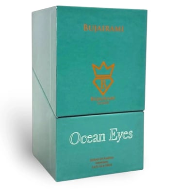 Bujairami Ocean Eyes by Bujairami 100ml Extrait — Teal two-tiered box packaging with gold crown logo and "Ocean Eyes" text