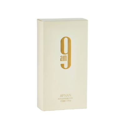 Afnan 9 AM by Afnan 100 ml EDP Unisex — A cream-colored perfume box with a large gold number 9 and the text 'am' below it. The brand name 'AFNAN' and product details are at the bottom.