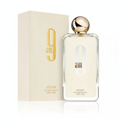 Afnan 9 AM by Afnan 100 ml EDP Unisex — Cream box with gold "9 am" logo next to a clear glass perfume bottle with gold cap