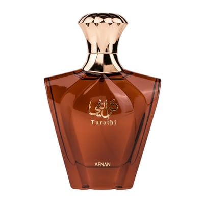 Afnan Turathi Brown – Amber glass perfume bottle with gold cap and Arabic script on a white background.