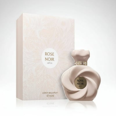 Ahmed Al Maghribi Rose Noir — A pale pink, swirling perfume bottle stands next to its matching box with floral patterns.