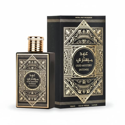 Al Wataniah Oud Mystery Intense — Black perfume bottle with gold accents and matching box, both featuring ornate geometric