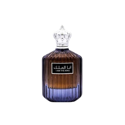 Ard Al Zaafaran I Am The King — Amber and blue glass perfume bottle with a silver crown cap and a black label.