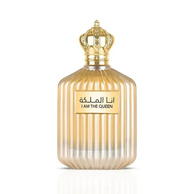 Ard Al Zaafaran I Am The Queen — Gold fluted glass perfume bottle with a golden crown cap, featuring an Arabic and English
