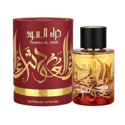 Ard Al Zaafaran Thara Al Oud Supreme Intense – Red cylindrical box and clear glass bottle with gold Arabic script and dark