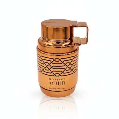 Armaf Aoud Odyssey — Copper-toned perfume bottle with intricate black geometric pattern and a hinged handle on the cap