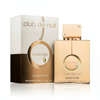 Armaf Club De Nuit Milestone — Gold perfume bottle and box with chain detail and 'MILESTONE' text