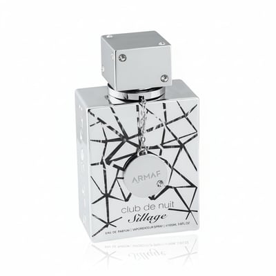 Armaf Club De Nuit Sillage — Silver geometric patterned bottle with a silver cap adorned with crystals, and a circular