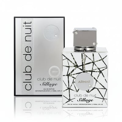 Armaf Club De Nuit Sillage — Silver box and bottle with geometric pattern and crystal accents, isolated on white.