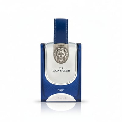 Armaf Rugir Lions Club — Blue glass perfume bottle with silver lion emblem and blue leather strap, on white background.