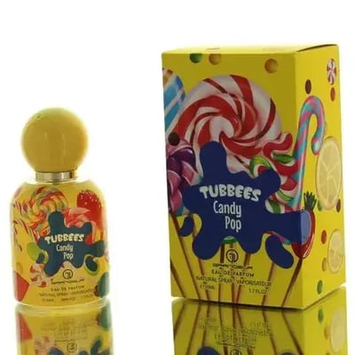 Grandeur Candy Pop by Grandeur Tubbees 50ml EDP for Her — Yellow perfume bottle with colorful candy designs and a yellow spherical cap, next to its matching yellow box featuring a large lollipop and candy graphics.