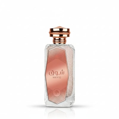 Al Wataniah Shouq Pink by Al Wataniah 100ml EDP Women — Clear glass perfume bottle with rose gold cap and a rose gold geometric label featuring Arabic script and 'SHOUQ' text.