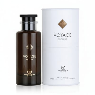 Grandeur Voyage Exclusif by Grandeur Elite – Dark brown glass perfume bottle with gold emblem and black cap, next to a white cylindrical box with gold emblem and text.