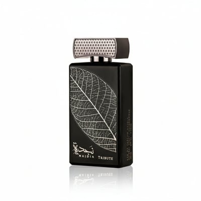 Lattafa Najdia Tribute — Black perfume bottle with a silver leaf imprint and a textured silver cap, set against a white background.