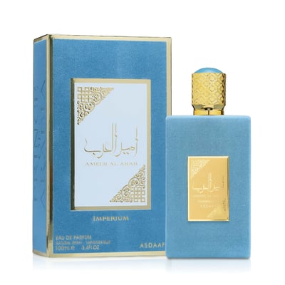 Lattafa Ameer Al Arab Imperium by Asdaaf — Blue velvet perfume box and bottle with gold accents and Arabic script.
