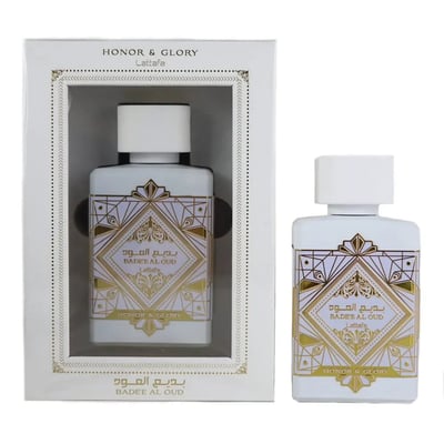Lattafa Badee Al Oud Honor Glory — White perfume bottle with gold geometric design, shown next to its open white box.