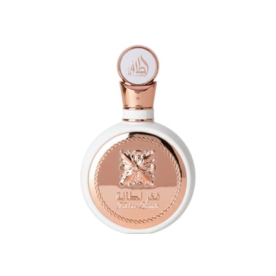 Lattafa Fakhar Rose Gold by Lattafa 100ml Women — White round bottle with rose gold accents and Arabic calligraphy on the