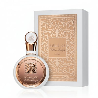 Lattafa Fakhar Rose Gold by Lattafa 100ml Women — White perfume bottle with rose gold accents and ornate emblem next to a