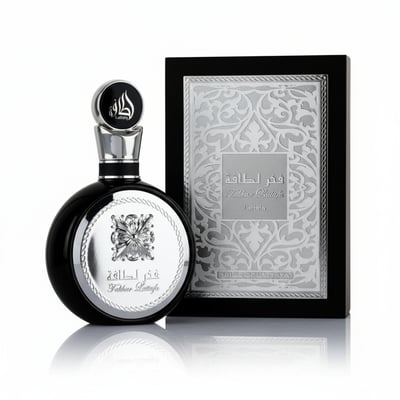Lattafa Fakhar Silver by Lattafa 100ml EDP Men — Black perfume bottle with silver emblem next to a black box with silver