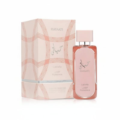 Lattafa Hayaati Florence by Lattafa 100ml EDP Women — Pink patterned box and pink glass perfume bottle with silver accents, displayed together on a white background.