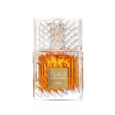 Lattafa Khamrah by Lattafa 100ml EDP Unisex — Amber liquid in a clear, textured glass bottle with a decorative clear cap and a gold label.