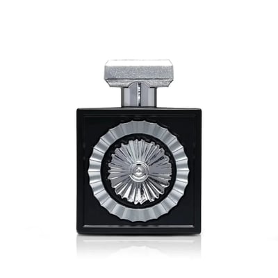 Lattafa Pride Wajood by Lattafa – 100 ml Eau de Parfum for Men, a black square perfume bottle with a silver ornate circular emblem and a textured silver cap.