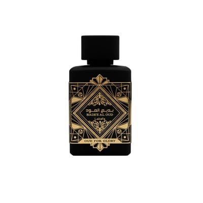 Lattafa Badee Al Oud — Black perfume bottle with gold geometric design and Arabic text.